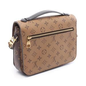 Louis Vuitton bag black handbag brown leather Reverse Monogram Metis